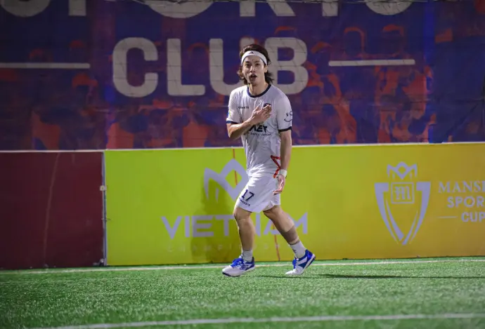 club members play football in saigon