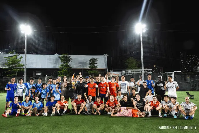 club members play football in saigon